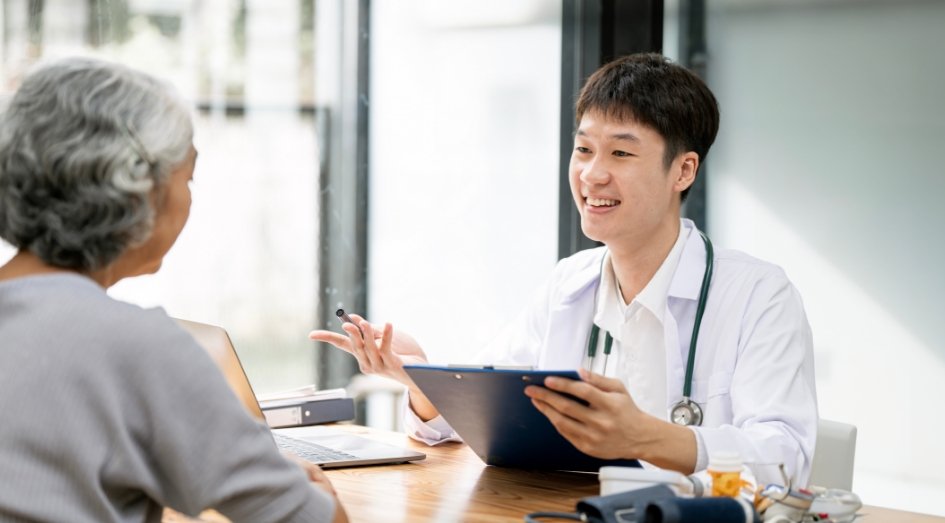 An Asian doctor meeting a patient